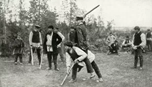 Finland Gallery: Peasant men playing a game in a field, Finland