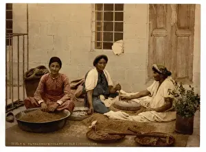 Peasants grinding corn at Jerusalem, Holy Land