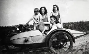 Badge Prints: Four people on a 1929 Ariel motorcycle & sidecar