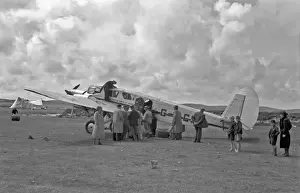 Spartan Prints: People on airfield with light aircraft, Scotland