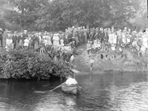 People at a boating event in the Wye Valley, Mid Wales