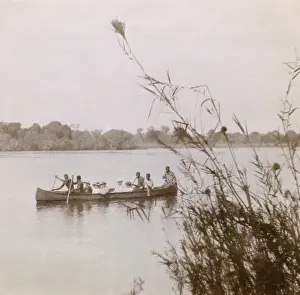 Boatman Prints: People on a boating trip, Zambezi River, Africa