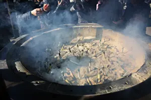 People burning incense at Senso Ji Temple in Asakusa, Tokyo