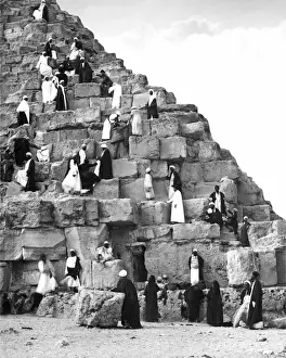 Steep Prints: People climbing the Great Pyramid, Egypt