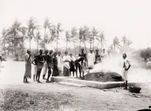 Funeral Gallery: People around a cremation funeral pyre, India