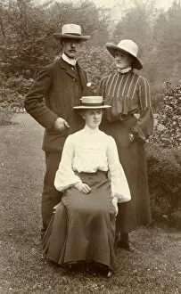 Three people in a garden, Blanefield, Scotland