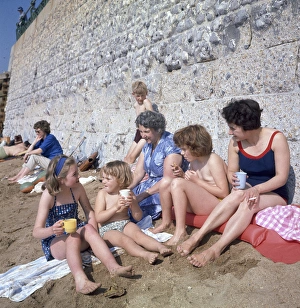 Woman and child at the seaside