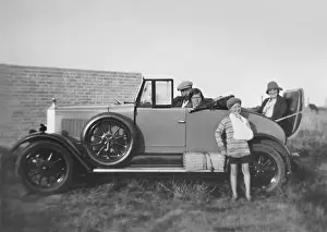Topped Prints: People in open-topped car