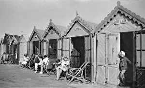 Deckchairs Collection: People outside beach huts, Cayeux, France