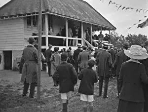 Raincoat Prints: People outside a sports pavilion