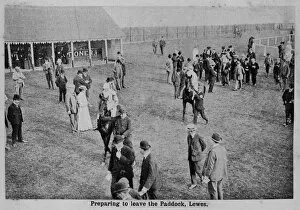 People in the paddock at Lewes racecourse, Sussex