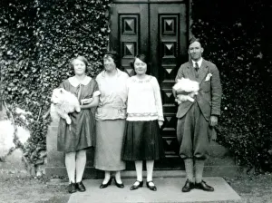 Four people with two pet dogs, Scotland