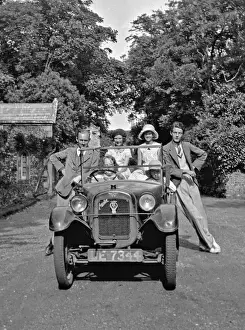 Membership Prints: People posing with Austin car