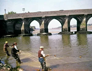 Arches Collection: People salmon netting at Bideford, Devon