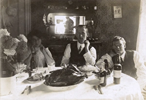 Roast Gallery: Three people at a table, photographer reflected in mirror