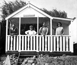 Enjoying Collection: People in a typical beach hut or chalet, Walton, Essex