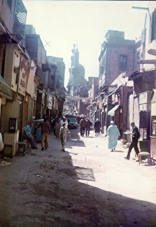 Images Dated 25th July 2016: People walking and sitting, Cairo, Egypt