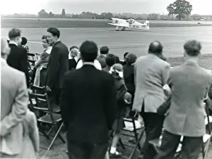 Wisley Prints: Percival E2 Mew Gull, G-AEXF, taxies past spectators at ?