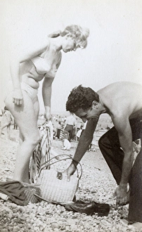 Images Dated 19th May 2017: The perennial difficulty of getting changed on the beach