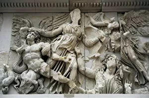 Berlin Collection: Pergamon Altar. Athena against the giant Alcyoneus