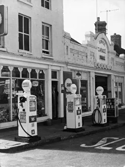 Garage Gallery: Petrol pumps on the pavement at a service station at Ellesmere, Shropshire, England