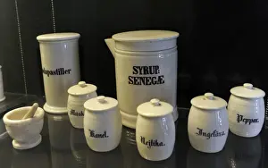 Finland Prints: Pharmaceutical containers with inscriptions, and mortar. pha