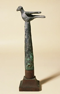 Phoenician art. Bronze badge, topped with a bird. Manacor. S Phoenician art. Bronze badge, topped with a bird. Manacor. S