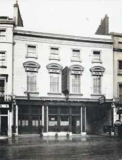 Prints of Photograph of Archery Tavern, Bayswater, London. The main side of the print (shown here) depicts: Face on view of the pub The National Brewery Centre Archives Prints: Photograph of Archery Tavern, Bayswater, London