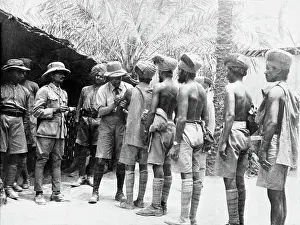 Receive Prints: Photograph of Indian troops lined up to receive inoculations