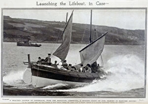 Launching Collection: Photograph of a practice launch of the Lifeboat, Coversack, Cornwall. Outdoor seascape action shot