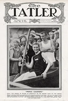 A photograph of the Prince of Wales at Honolulu, Hawaii, on his second tour of the empire. The Prince is sat in a Hawaiian canoe whilst being taught surf-riding by Duke Kahanamoku. Date: 26th May 1920
