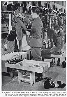 Nationalists Prints: Photograph showing two Civil Guardsmen cleaning their kit in their barracks
