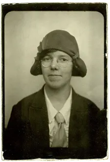 Photograph of a woman in a hat