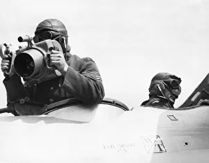 Aerial Photography Gallery: A Photographer with Hand-Held Oblique F7 Camera in the R?