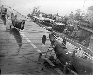 Three Piasecki HRP-1s on the flight deck of the aircraft car Three Piasecki HRP-1s on the flight deck of the aircraft car