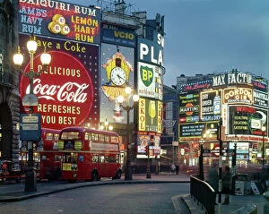 Coke Collection: Piccadilly Circus by night, London. Date: 1960s