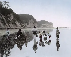 Picking shellfish along the seashore, Japan, c. 1890