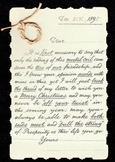 Twist Collection: Piece of string with comic letter on a Christmas card