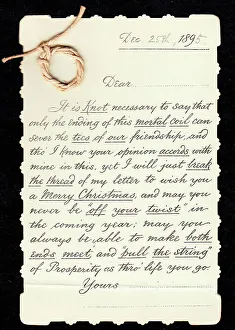 Twisted Prints: Piece of string with comic letter on a Christmas card