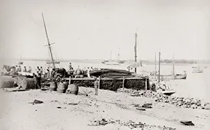 Pier and ship being unloaded, Cossack, Western Australia