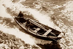Towed Prints: A Pilot cobble being towed by a ship in 1907