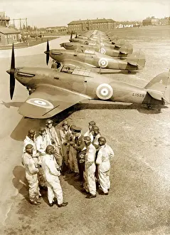1938 Prints: Pilot and Officer Standing with a Row of 111 Sqn Royal Airforce RAF Hawker Hurricane Mk 1S Parked Behind Date: 1938