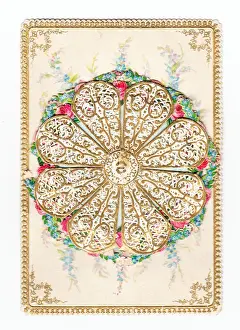 Pink and blue flowers on an ornate greetings card