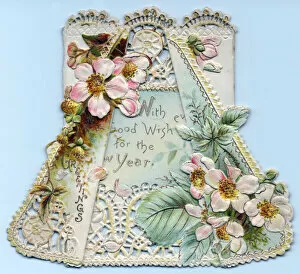 Images Dated 10th July 2018: Pink flowers on a cutout lacy New Year card