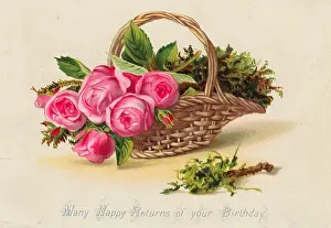 Pink roses in a basket on a birthday card