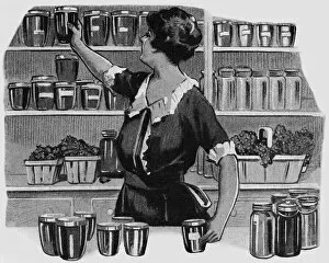 Images Dated 24th April 2018: Placing jam jar on a shelf