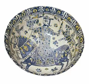 Plate decorated with a warrior, 10th c. Glazed Terracotta