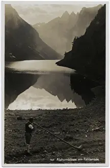 Blows Prints: Playing the Alpenhorn on banks of the Falensee, Switzerland