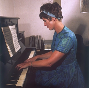 Images Dated 3rd October 2011: Playing the Piano
