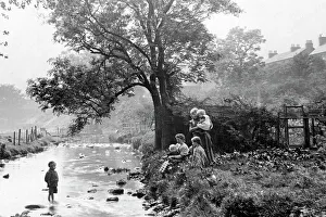 Togetherness Prints: Playing in the river at Duntocher, Scotland, early 1900s